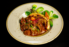 Stout infused Beef Stew with Mushrooms and Dark Chocolate served with Bread Dumplings